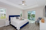 Master Bedroom with Sliding Glass Door leading out to the Lanai 